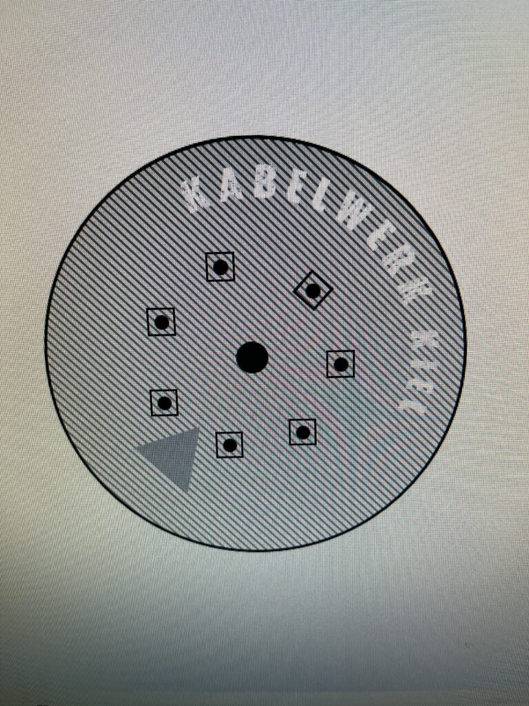 Um den schwarzen Punkt in der Mitte sind nun schwarze Quadrate mit einem schwarzen Punkt.
Und ein graues Dreieck ist dazu gekommen.